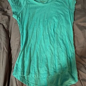A blue green tee